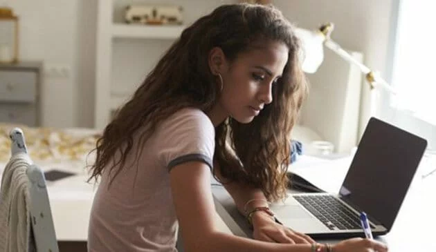 Teenager on Laptop