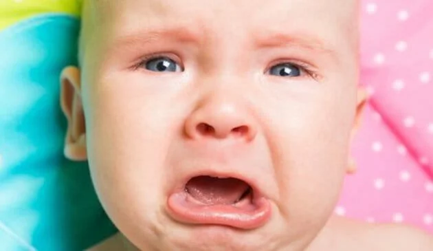 Close up of crying baby's face