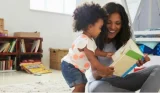 Mother and child reading together