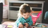 Child reading a book