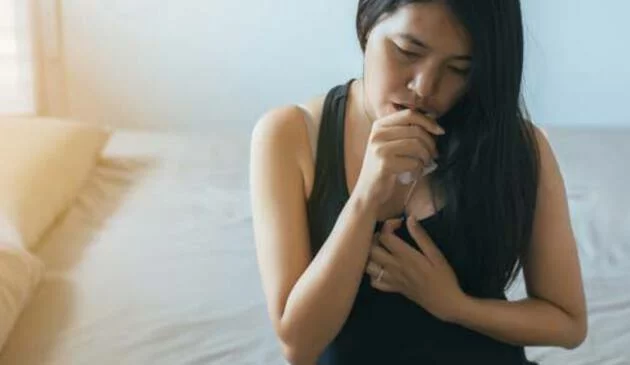 pregnant woman being sick