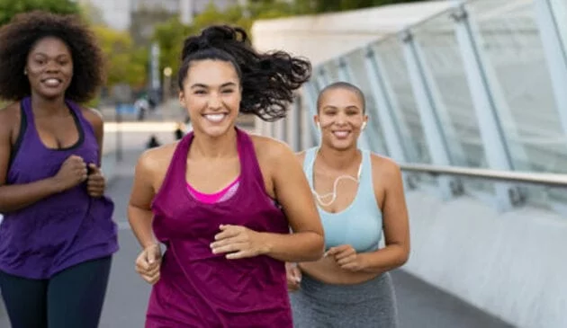Three women running