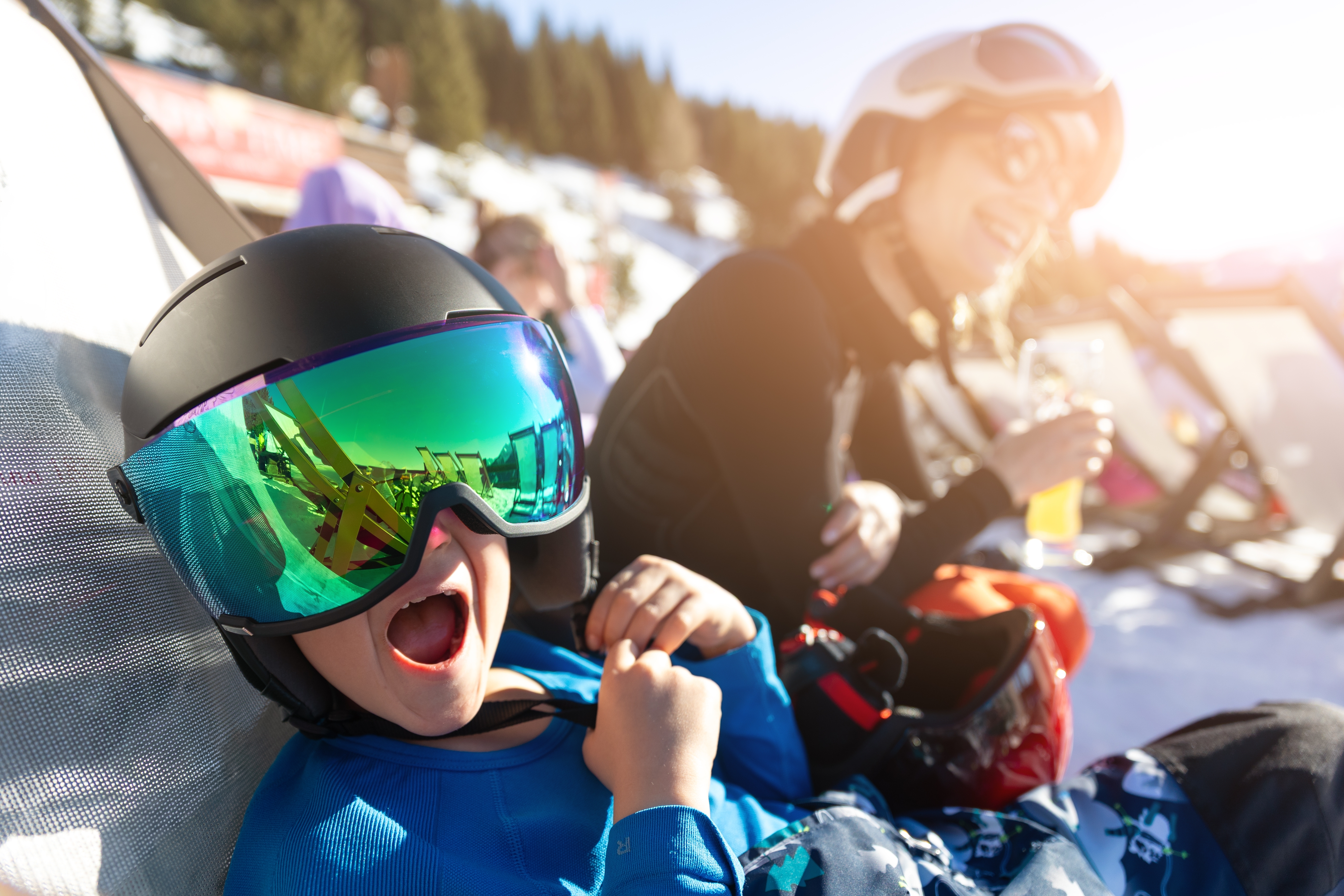 Child on ski holiday with family